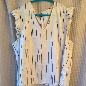 White and Black Ruffled Sleeveless Blouse